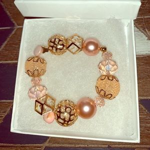 Pink and gold bracelet